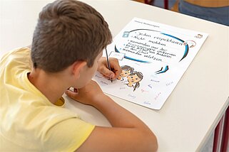 Foto einer Situation aus dem Medienpräventionsworkshop "Max & Mina" der Villa Schöpflin